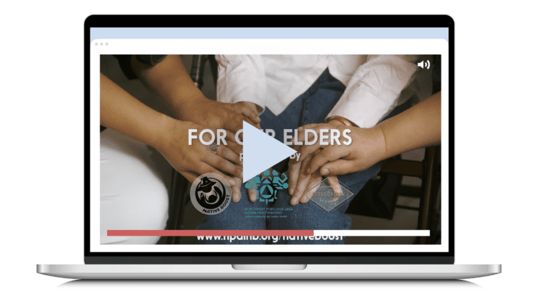 For Our Elders Video - A shot of multiple people holding hands. It almost looks like a prayer circle.